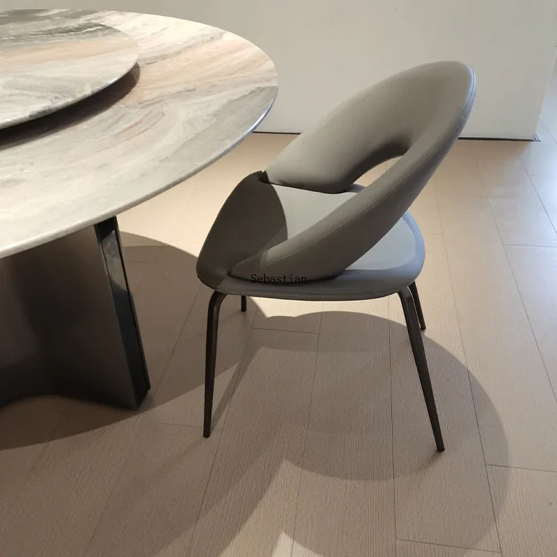 Modern Sculptural Bouclé Dining Chair with Curved Open Back & Metal Legs