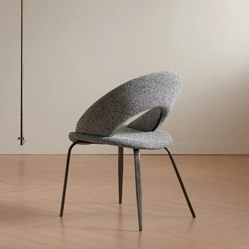 Modern Sculptural Bouclé Dining Chair with Curved Open Back & Metal Legs