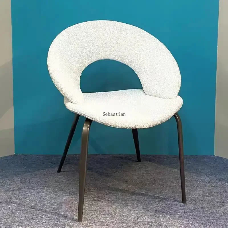 Modern Sculptural Bouclé Dining Chair with Curved Open Back & Metal Legs